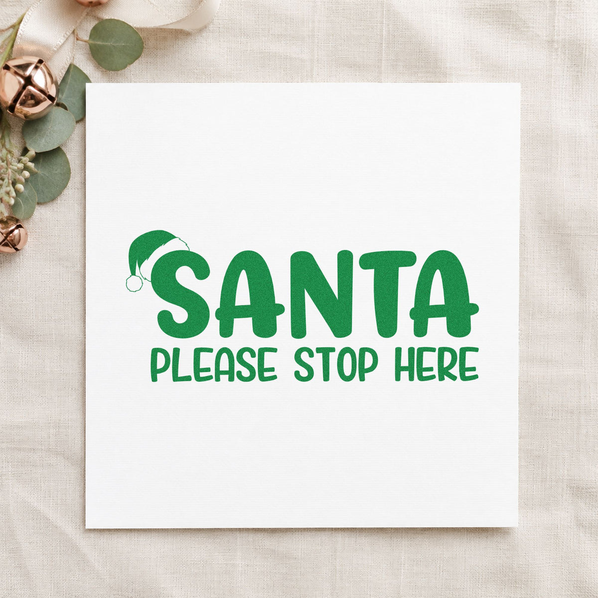 Santa Please Stop Here craft stamp imprint in green ink on a handmade project, one idea being chimney note cards.