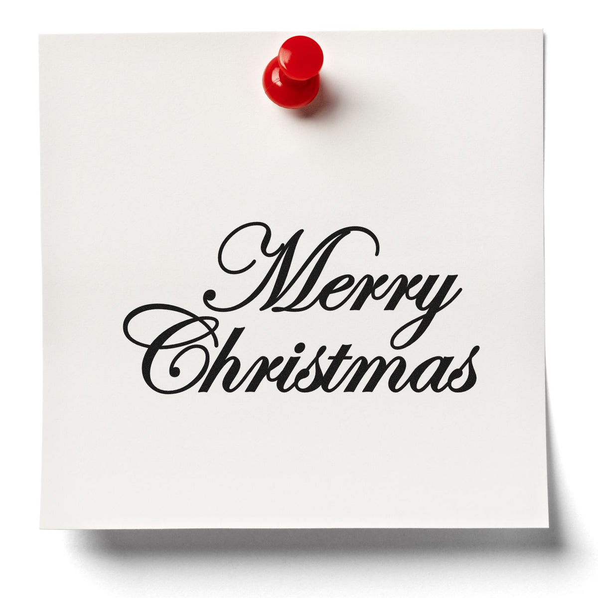 White Christmas stamp seal with black Merry Christmas script and red pushpin accent.