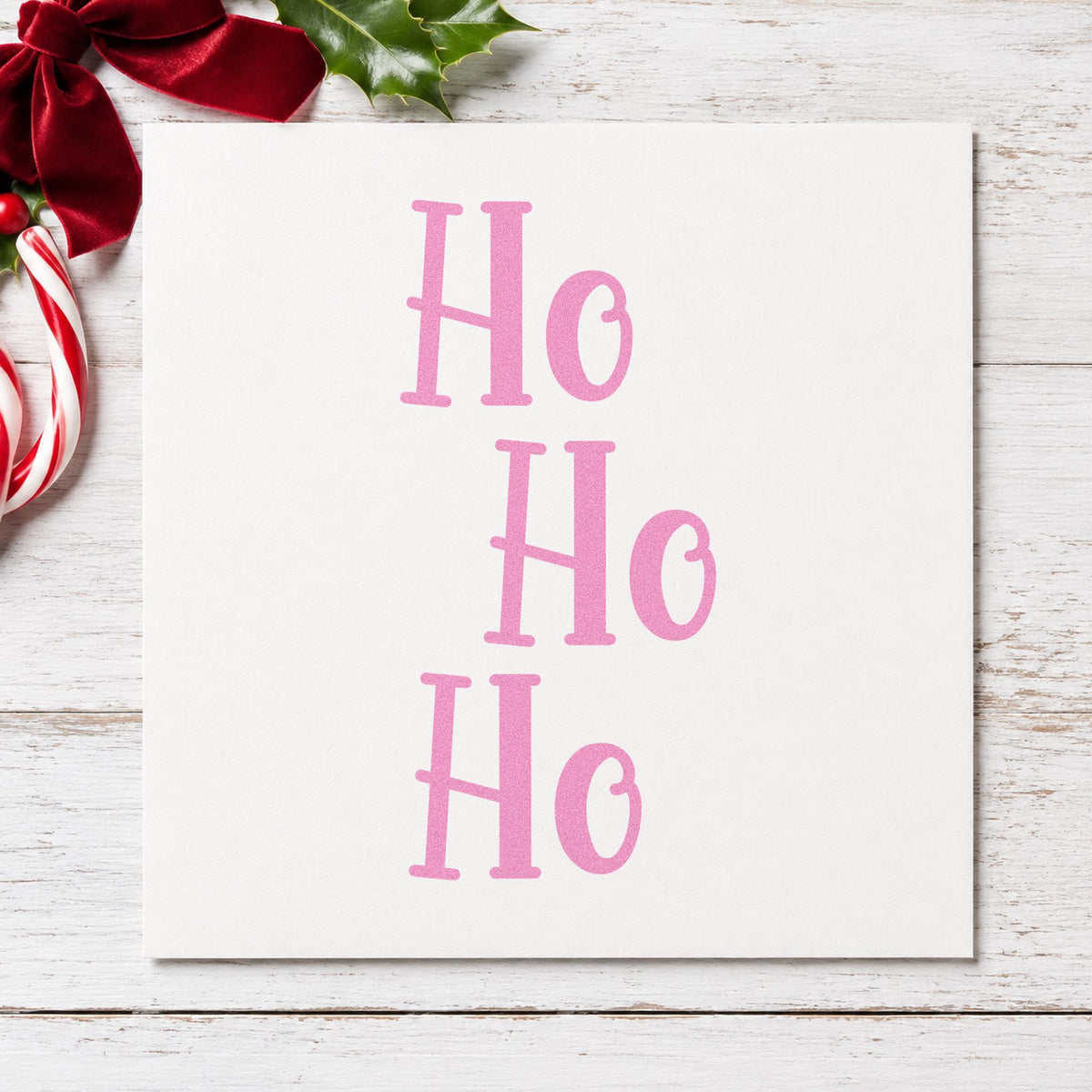 Three Stacked Ho Words craft stamp in purple ink on cardstock, an easy option for stepped album page.