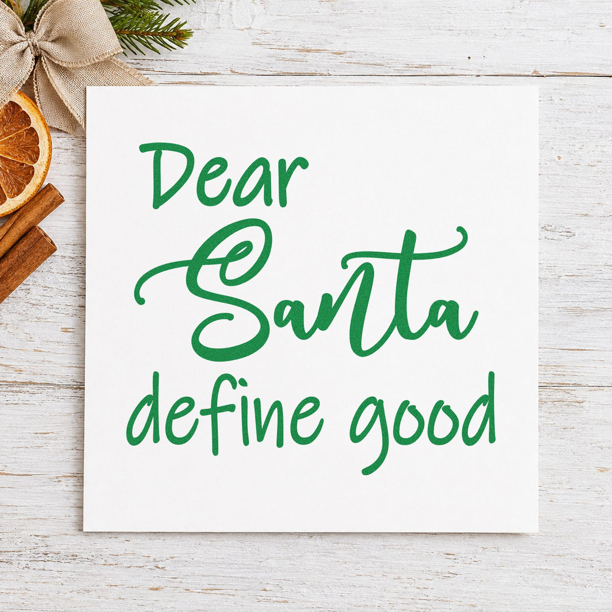 Dear Santa Define Good Script craft stamp imprint in green ink on a handmade project, one idea being desk gift tags.