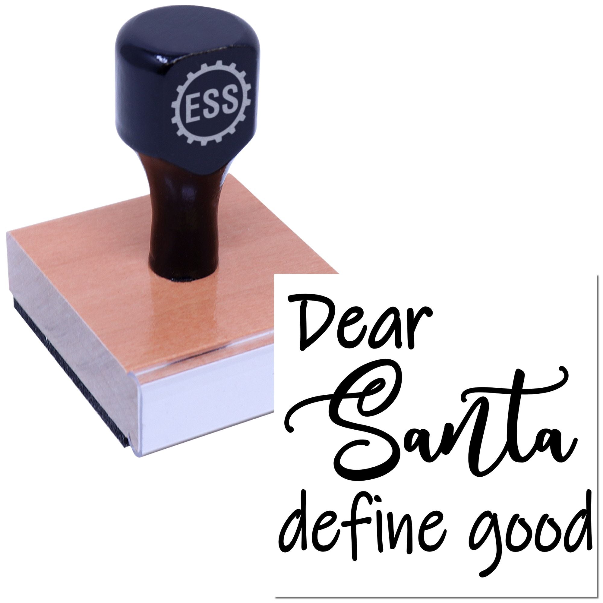Dark navy custom stamp and seal with ESS logo on a wooden block, printing black script text: Dear Santa define good.