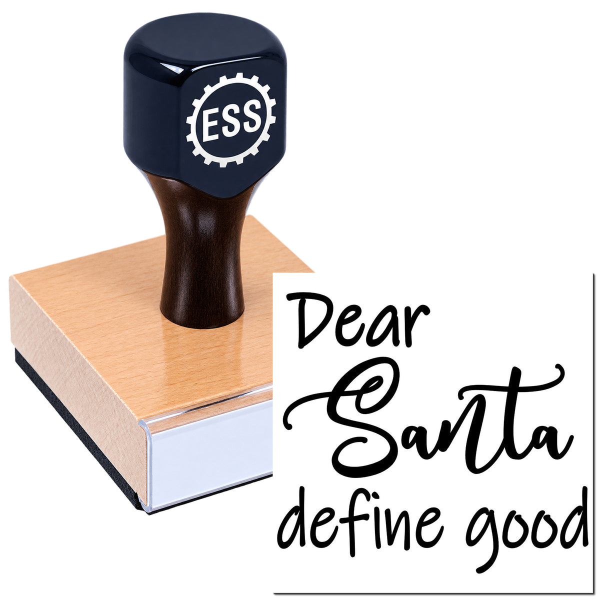 Dark navy custom stamp and seal with ESS logo on a wooden block, printing black script text: Dear Santa define good.