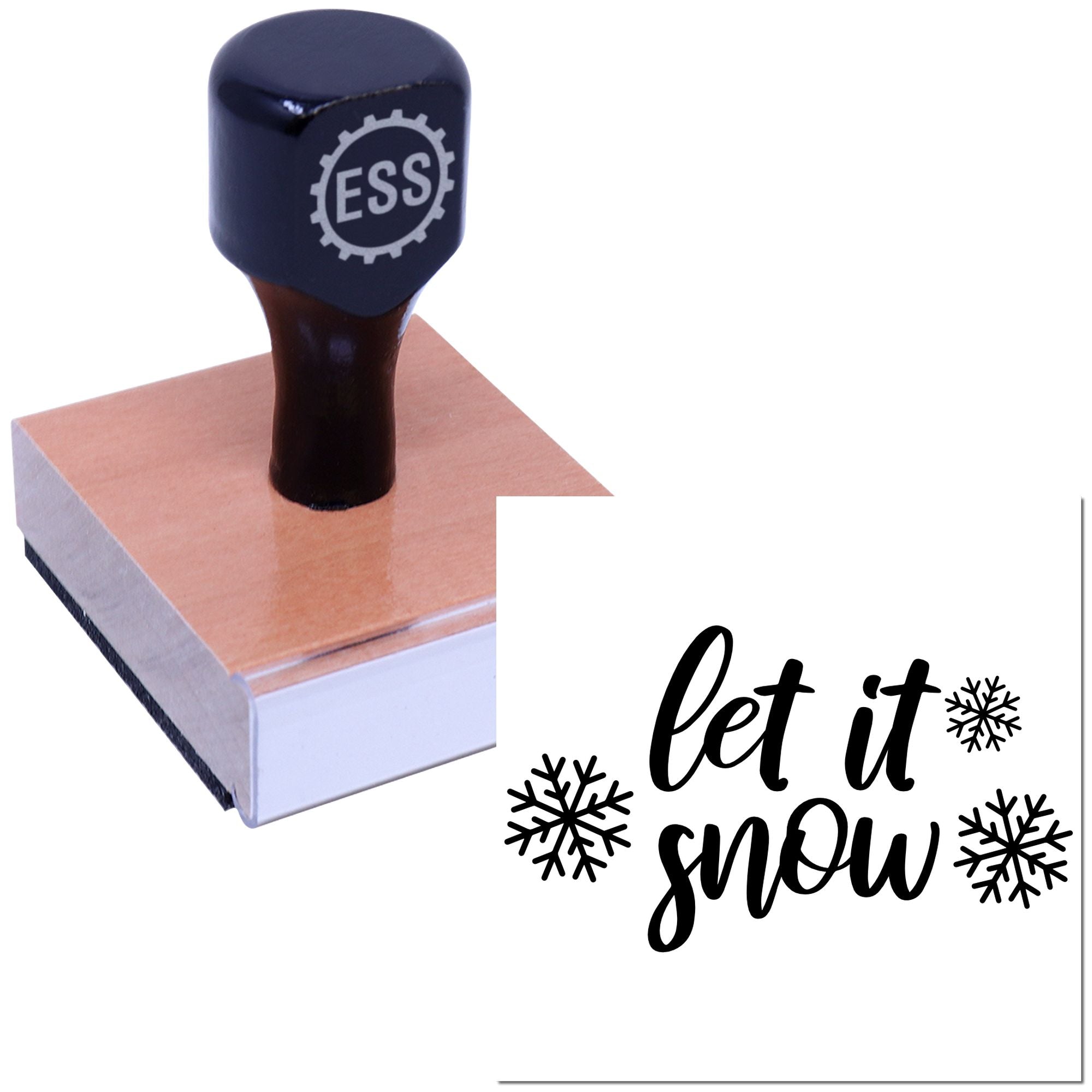 Dark blue ESS seal stamp on wood block beside black let it snow holiday stamp with snowflakes on white background.