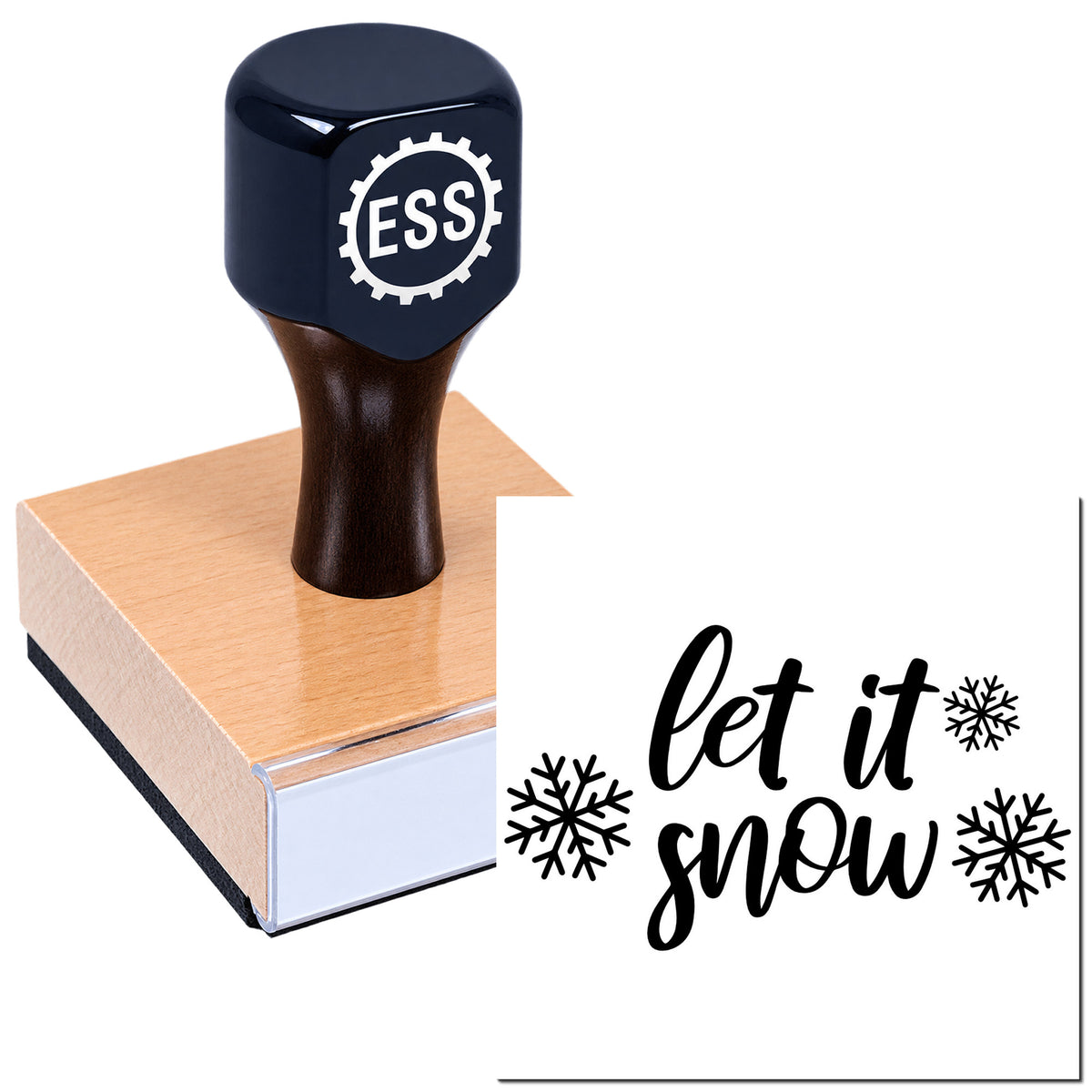 Dark blue ESS seal stamp on wood block beside black "let it snow" holiday stamp with snowflakes on white background.