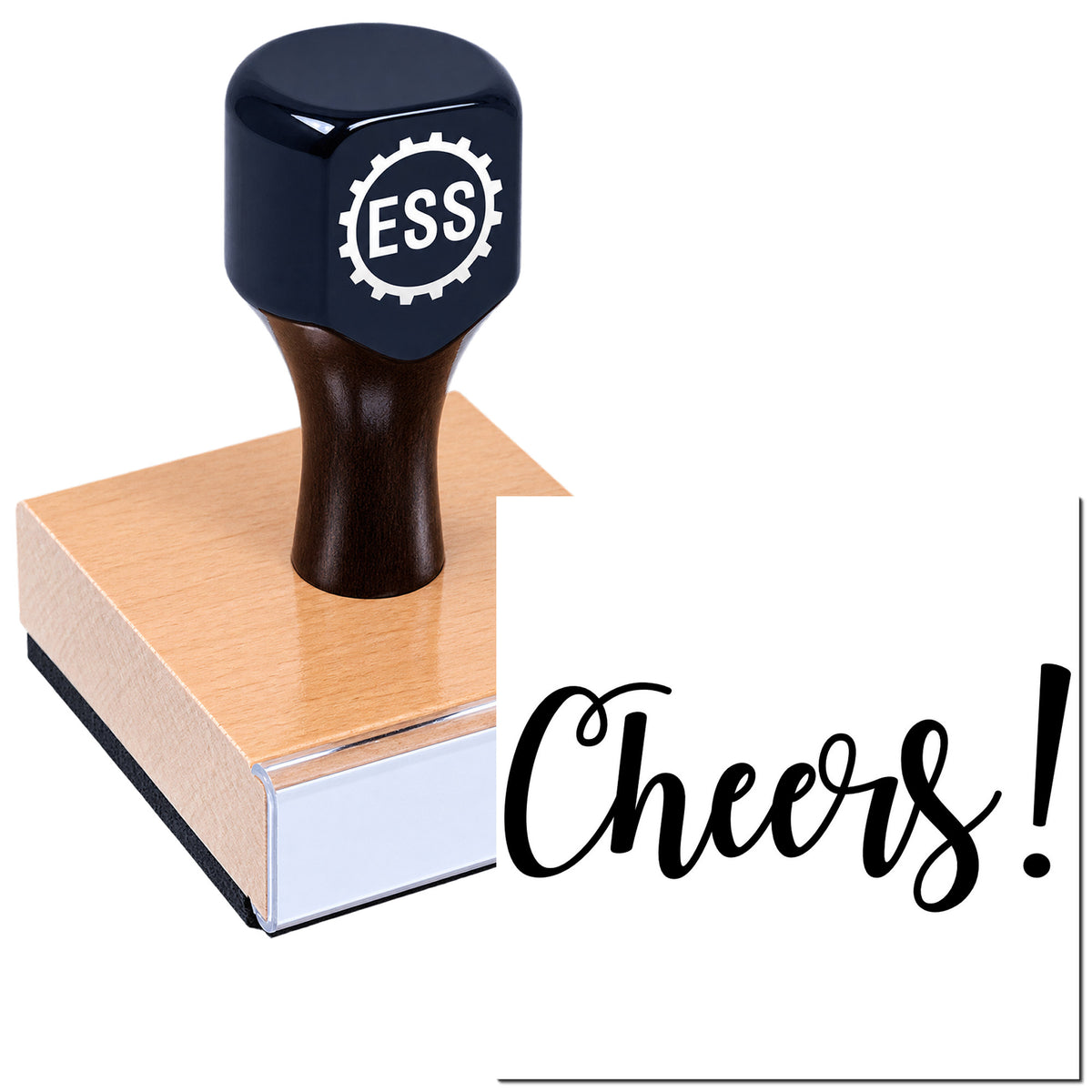 Black ESS stamp and seal on tan wooden block with white gear logo and "Cheers!" script