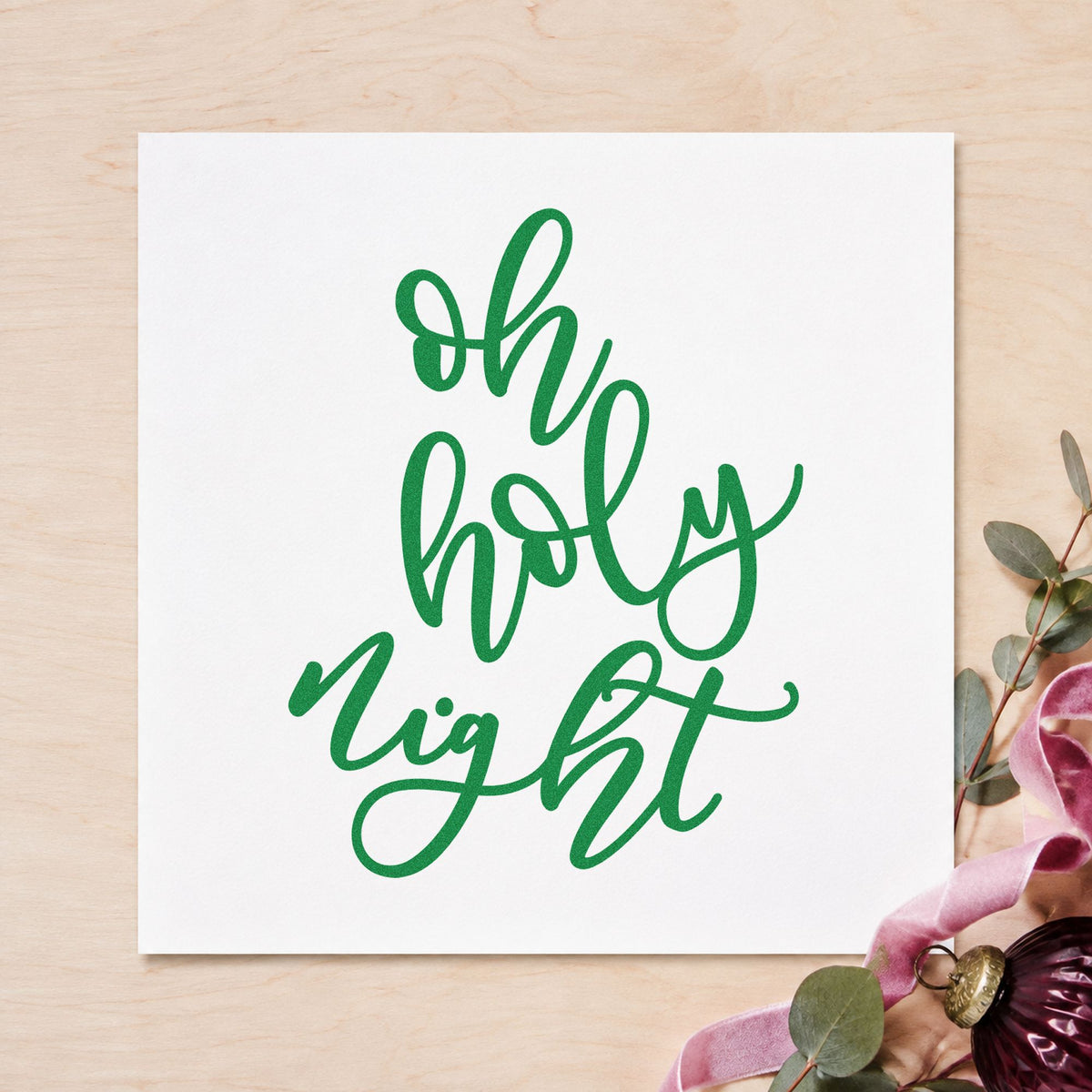 Oh Holy Night Script craft stamp imprint in green ink on a handmade project, one idea being note card gift tags.
