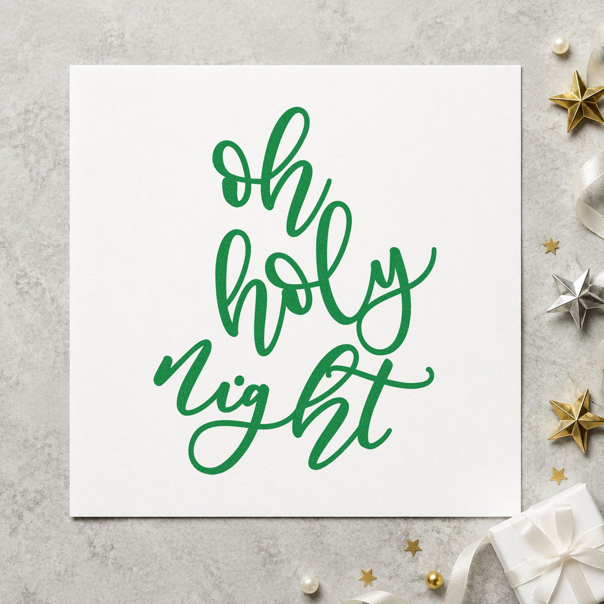 Oh Holy Night Script craft stamp imprinted in green ink on paper, a design suited to framed loft railing.