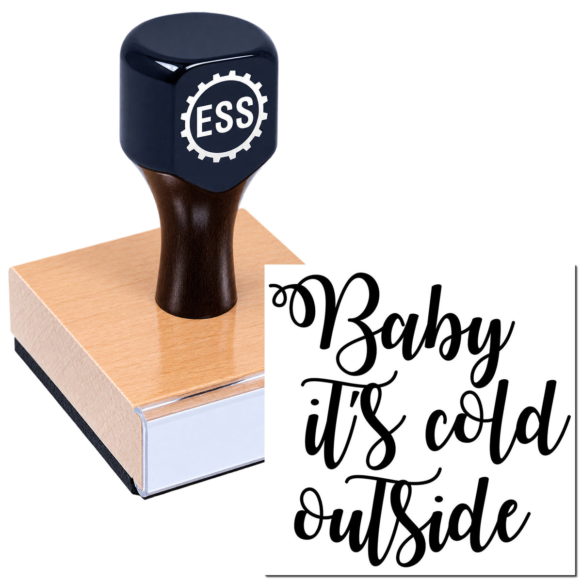 Dark navy ESS stamp on a wooden block beside a black "Baby It's cold outside" seal design