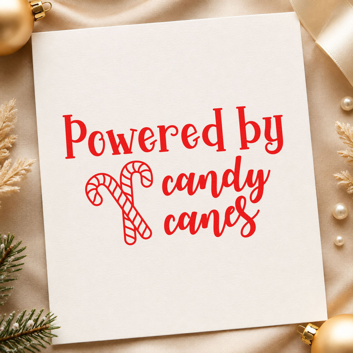 Powered By Candy Canes craft stamp in red ink on cardstock, an easy option for stripe apron printing.