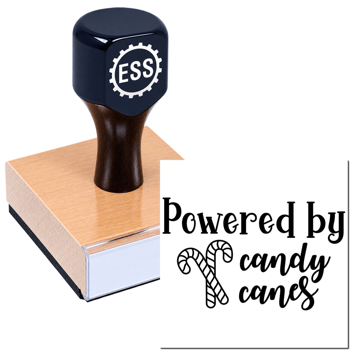Dark blue ESS stamp and seal on a wooden block, featuring "Powered by candy canes" text and candy cane graphic.