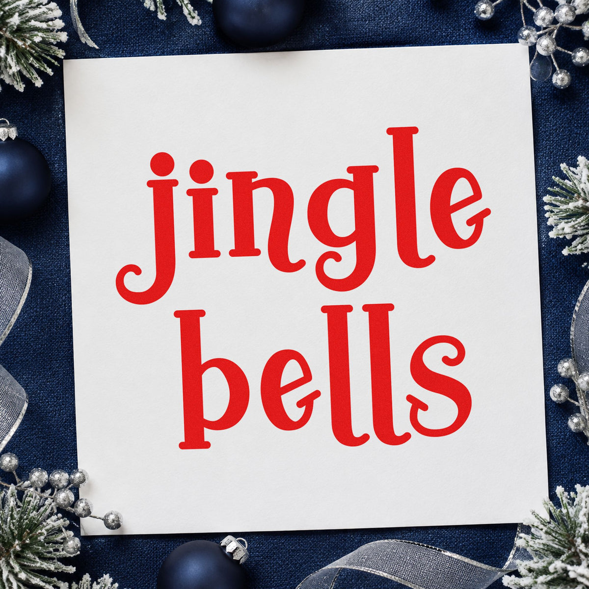 Jingle Bells Serif rubber stamp shown in red ink, stamped for projects such as foam pad labels.