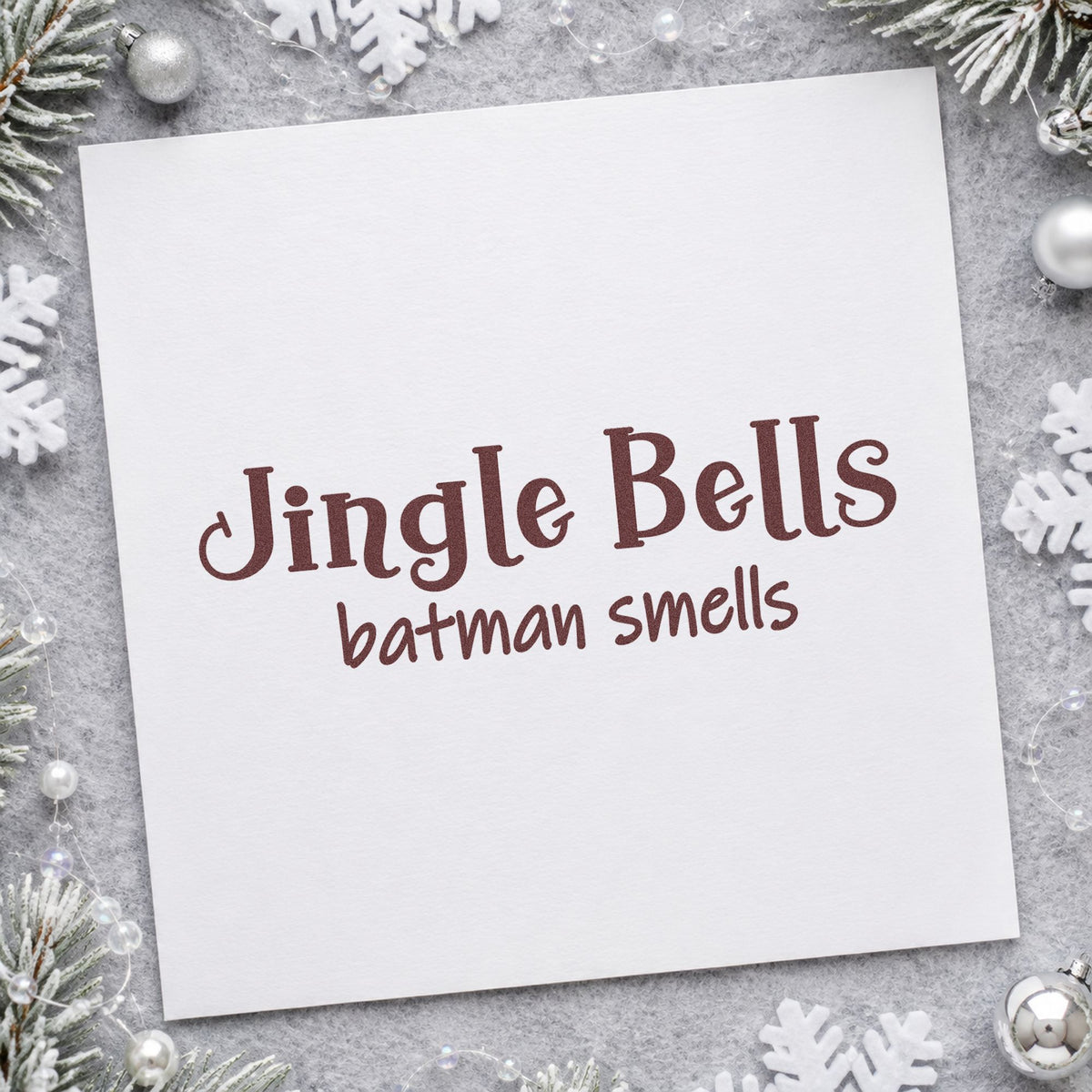 Jingle Bells Batman Smells rubber stamp printed in brown ink, ready for joke collection sheet and similar paper crafts.