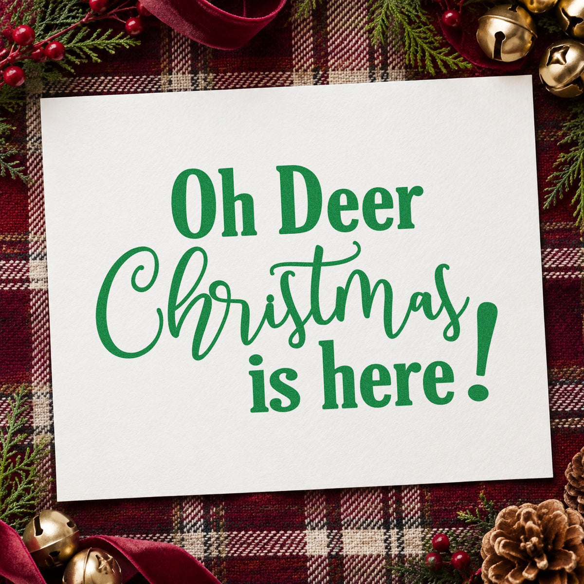 Oh Deer Christmas Here craft stamp imprint in green ink on a handmade project, one idea being clearance rack tags.