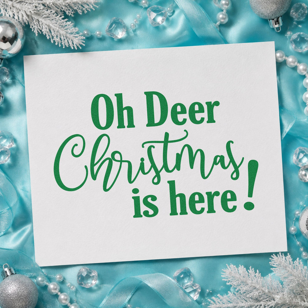 Oh Deer Christmas Here craft stamp imprinted in green ink on paper, a design suited to framed stockroom door.