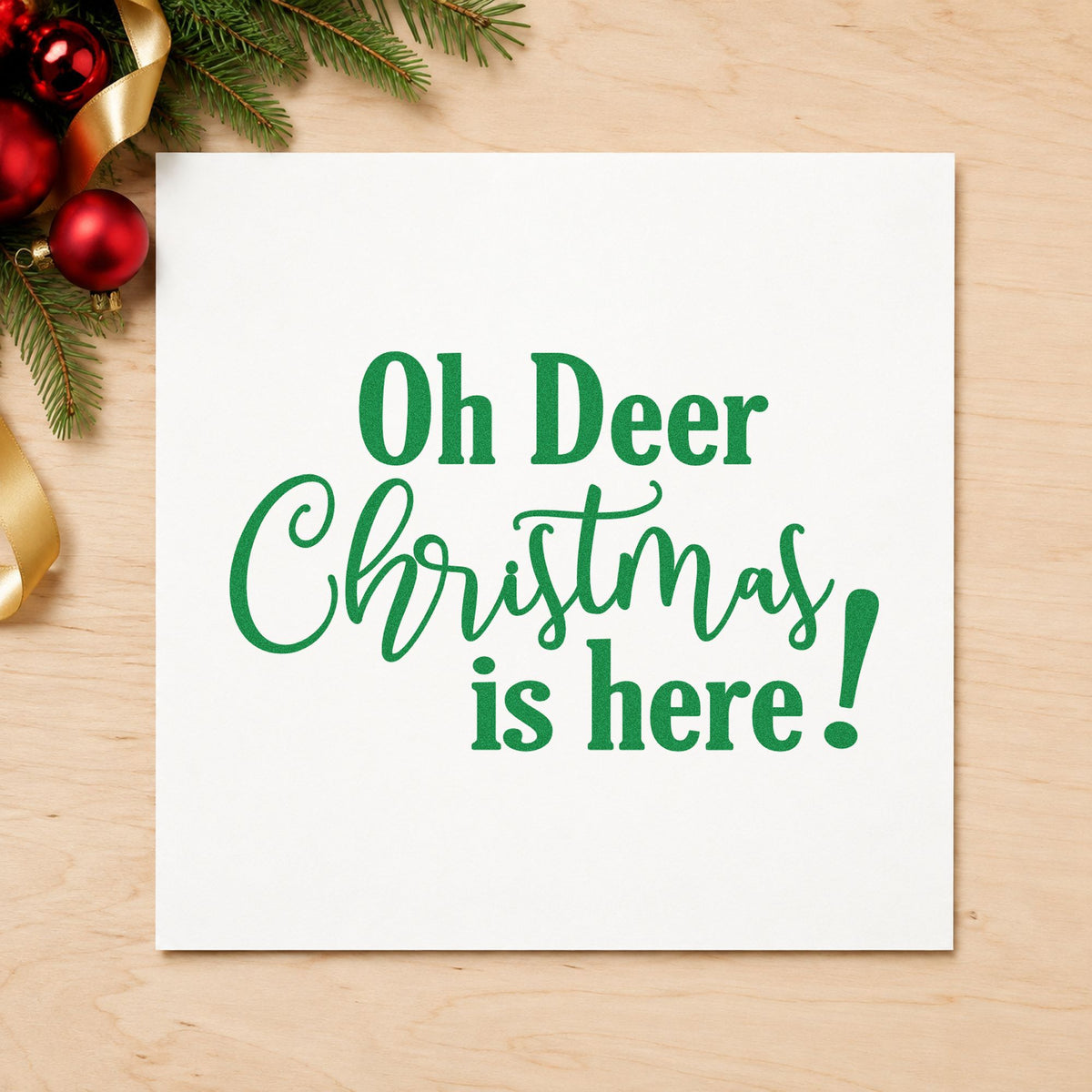 Oh Deer Christmas Here craft stamp imprint in green ink on a handmade project, one idea being extra hours placards.