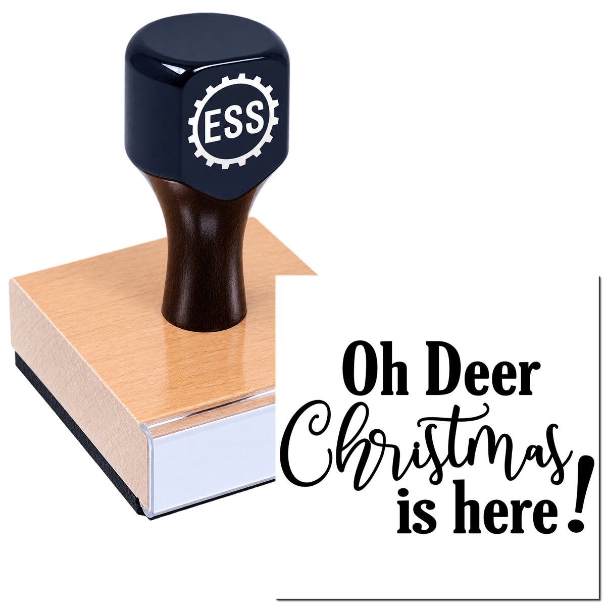 Dark navy ESS rubber stamp seal on wooden block beside white card with black "Oh Deer Christmas is here!" text.
