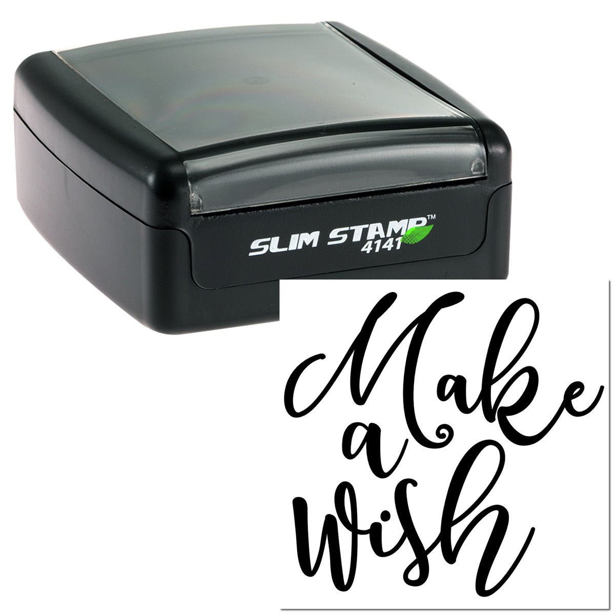 Black slim self-inking stamp with clear cap, showing a cursive Make a wish seal imprint on white background.