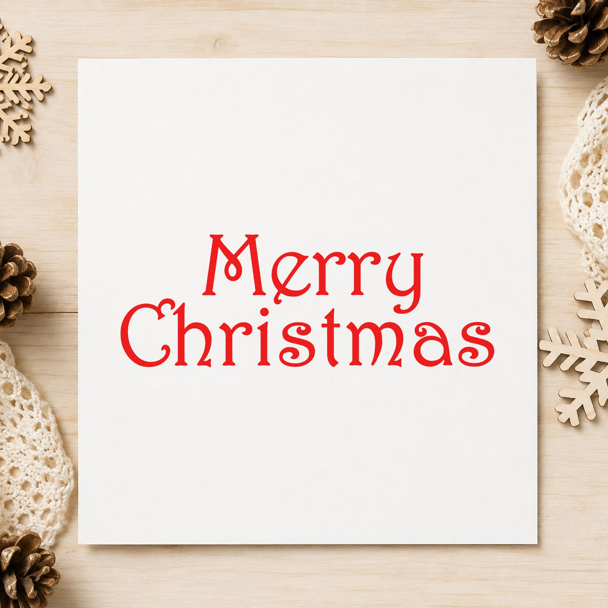 Merry Christmas Thin Serif craft stamp in red ink on cardstock, an easy option for organza ribbon ink.
