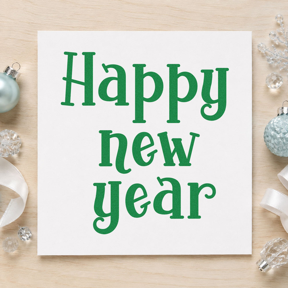 Happy New Year Serif craft stamp imprinted in green ink on paper, a design suited to framed office entry.
