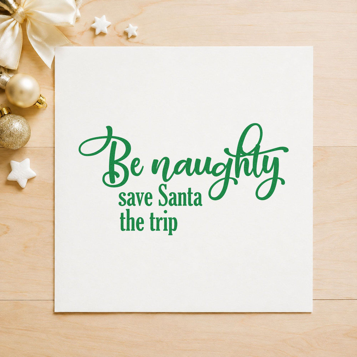 Be Naughty Save Santa Trip craft stamp imprint in green ink on a handmade project, one idea being bold gift tags.