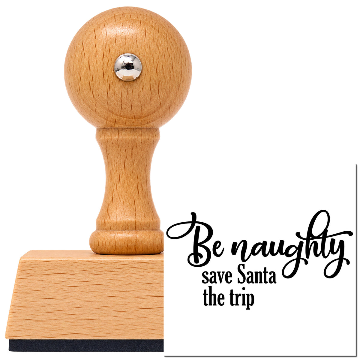 Vintage Pro beech wood stamp with a round knob handle, shown with its black Be Naughty Save Santa Trip imprint on white.