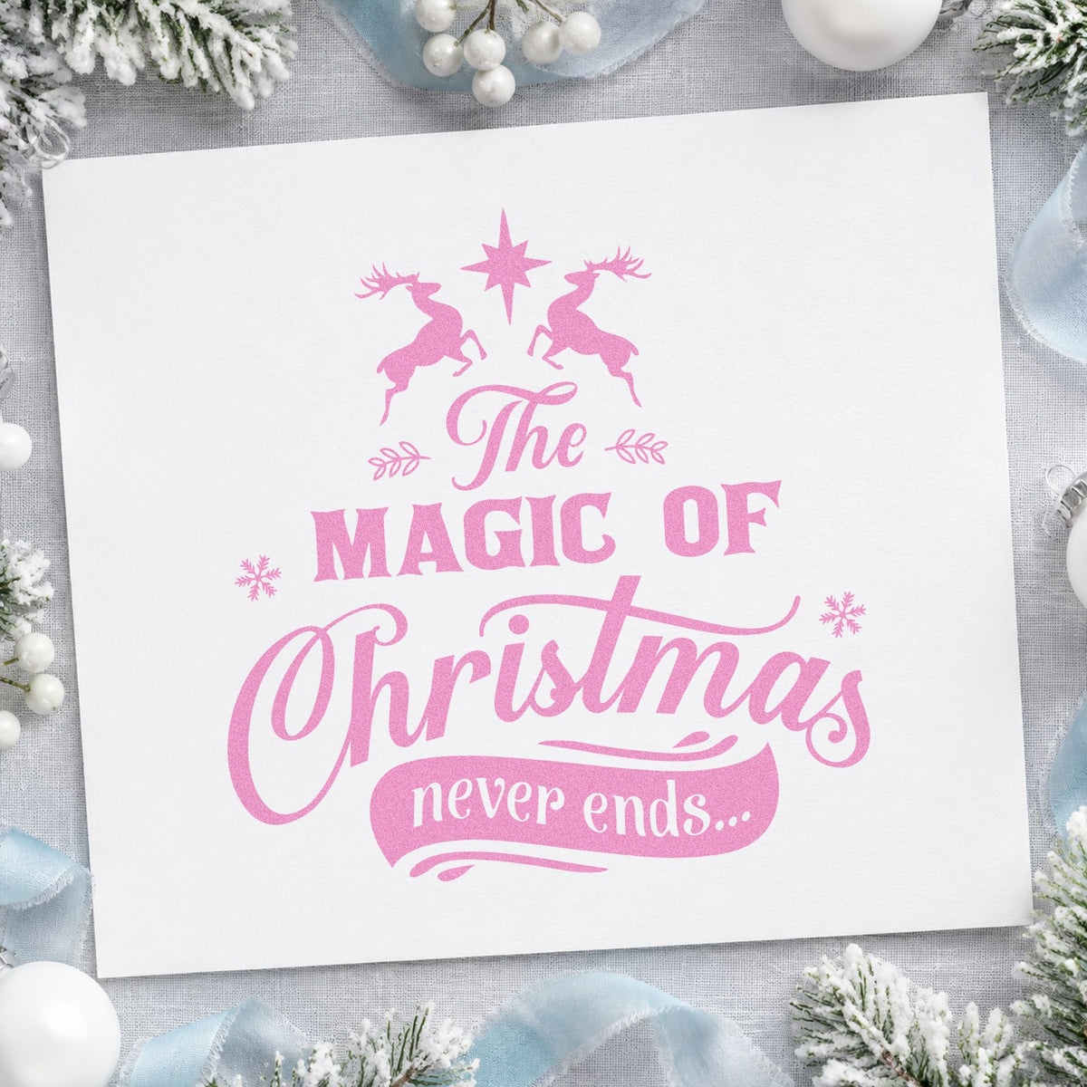 Magic Christmas Never Ends craft stamp in purple ink on cardstock, an easy option for year round album.