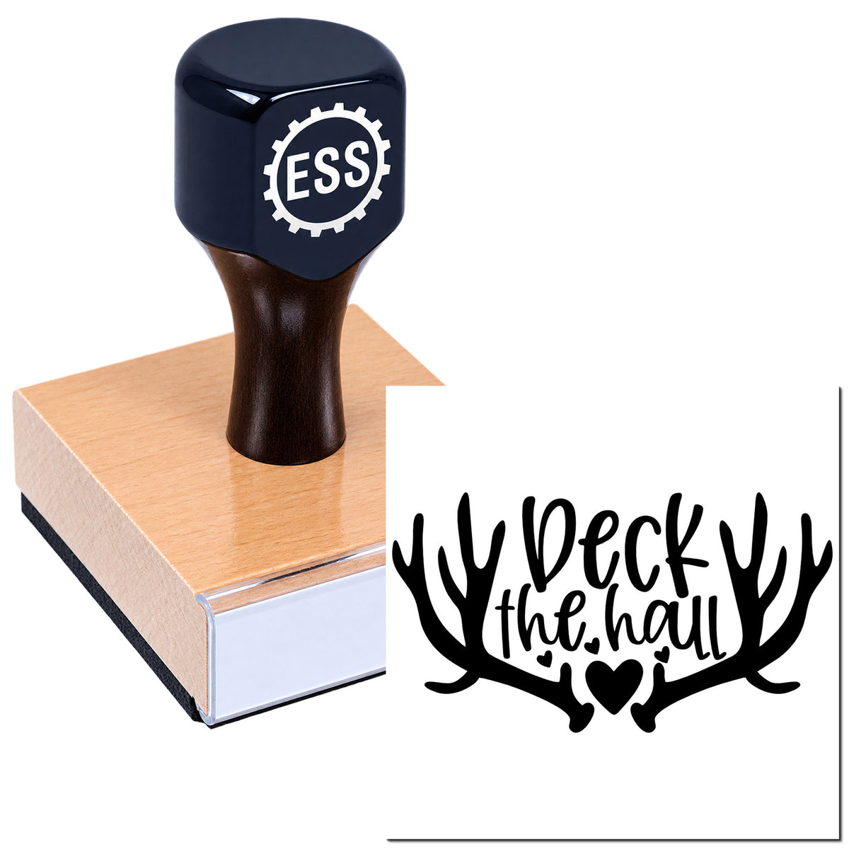 Dark navy ESS rubber stamp on a wooden block beside a black antler-and-heart seal reading Deer the hall.