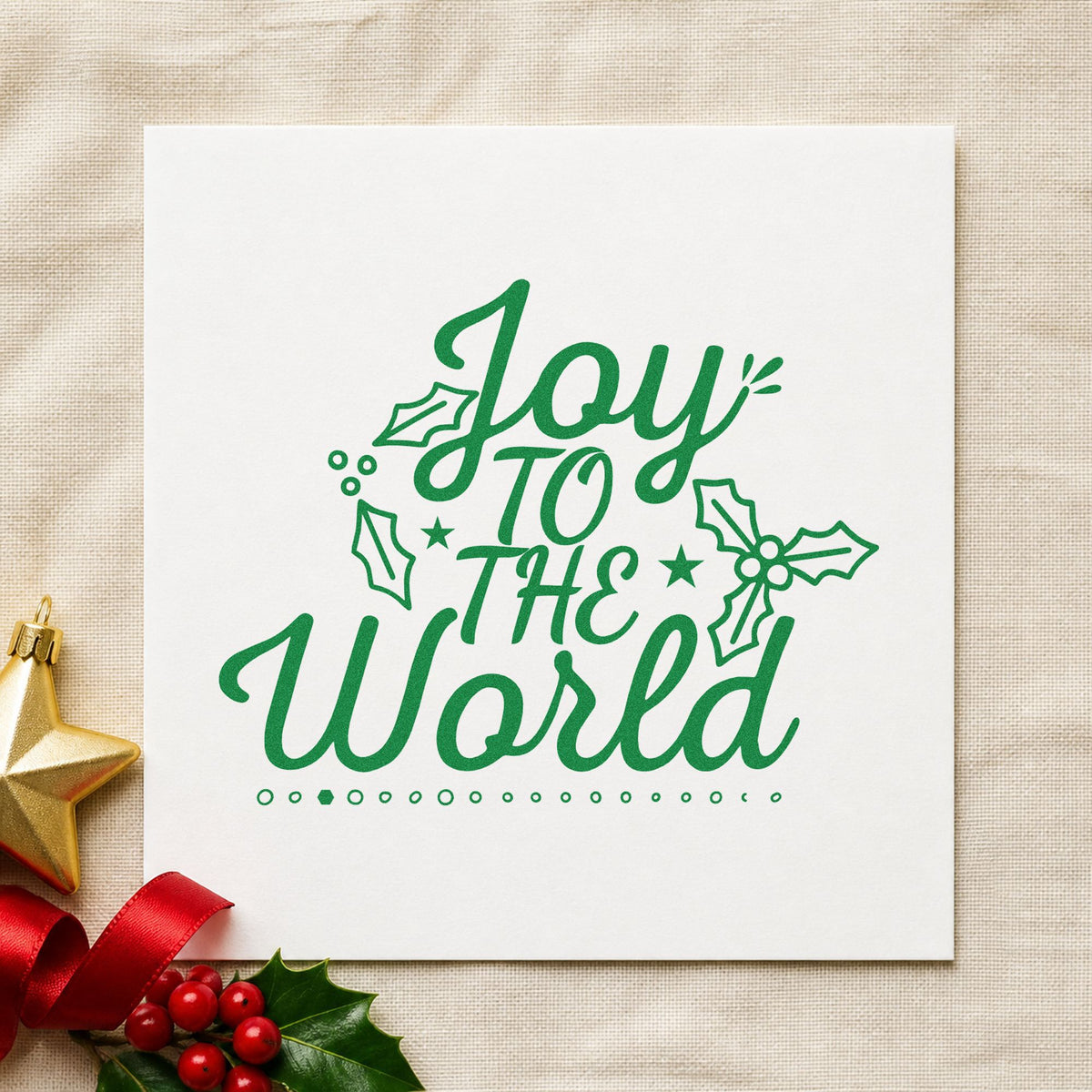 Joy To The World Holly craft stamp imprint in green ink on a handmade project, one idea being fundraiser gift tags.