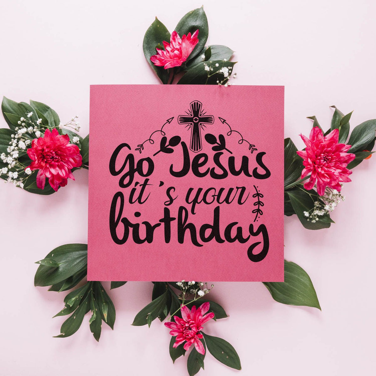 Pink stamp and seal design with black Go Jesus its your birthday text, cross, and pink flowers with green leaves.