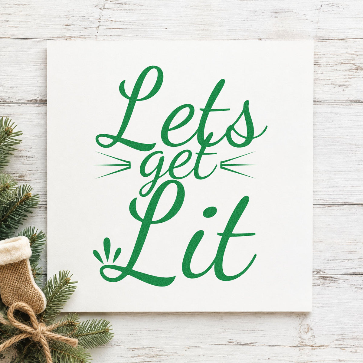 Let's Get Lit Script craft stamp imprint in green ink on a handmade project, one idea being bulb set gift tags.