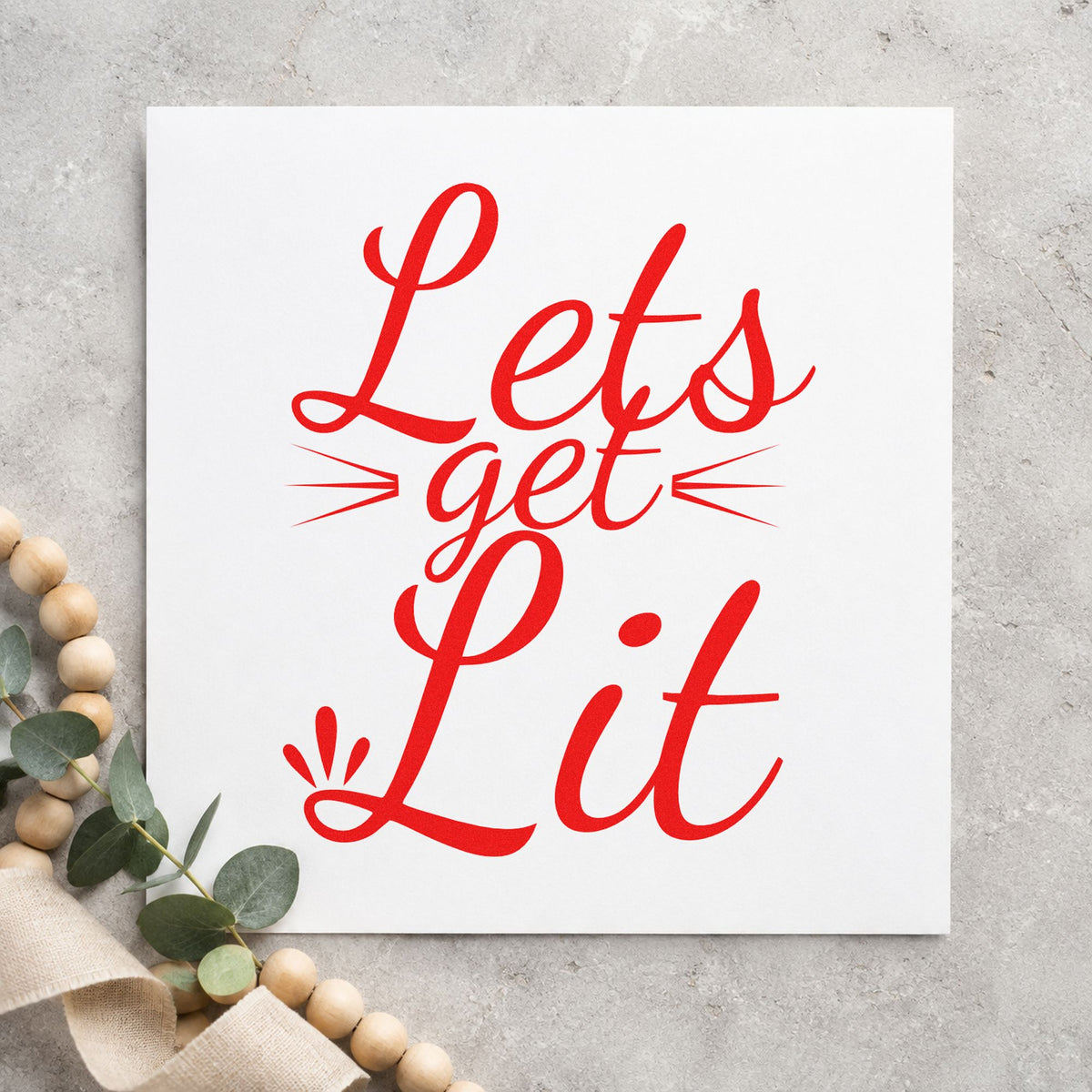 Let's Get Lit Script craft stamp in red ink on cardstock, an easy option for bar apron printing.