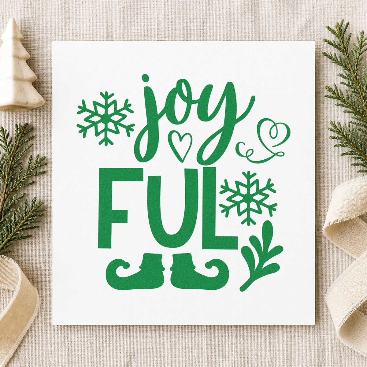 Joyful Elf Boots Snowflakes craft stamp imprinted in green ink on paper, a design suited to framed shelf stack.