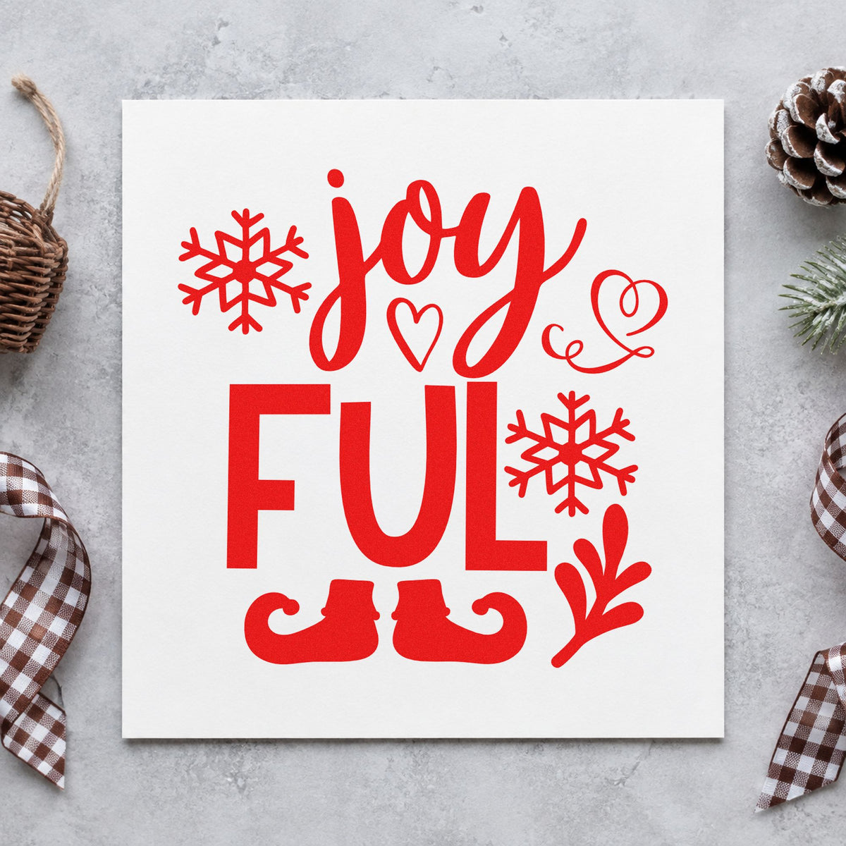 Joyful Elf Boots Snowflakes rubber stamp shown in red ink, stamped for projects such as two line labels.