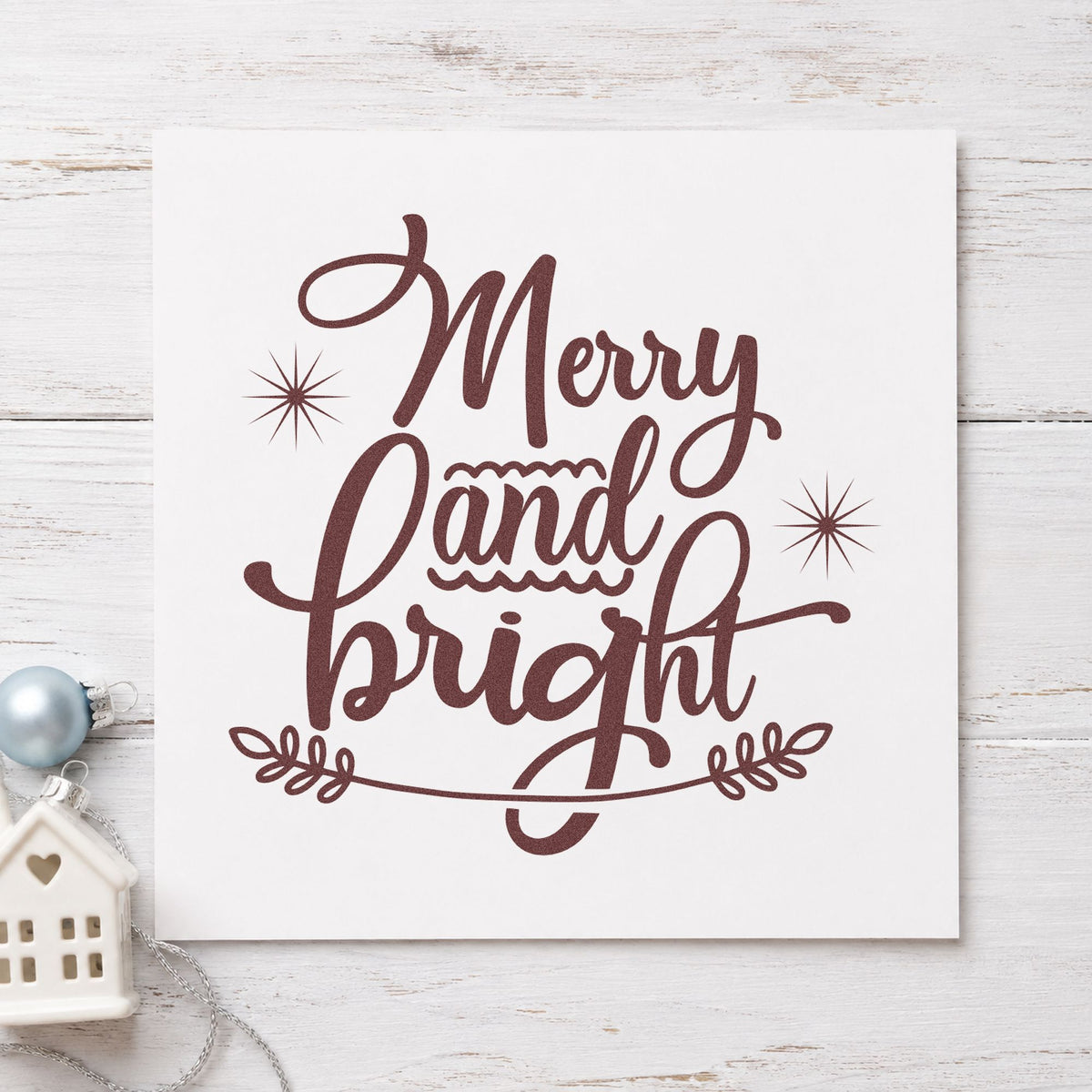 Merry And Bright Flourish rubber stamp printed in brown ink, ready for ink test log sheet and similar paper crafts.