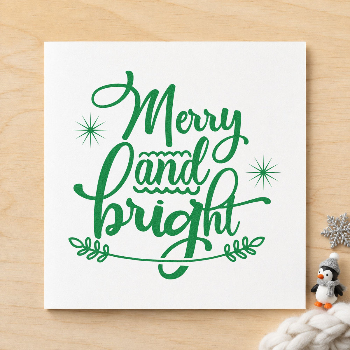Merry And Bright Flourish craft stamp imprint in green ink on a handmade project, one idea being formal table cards.