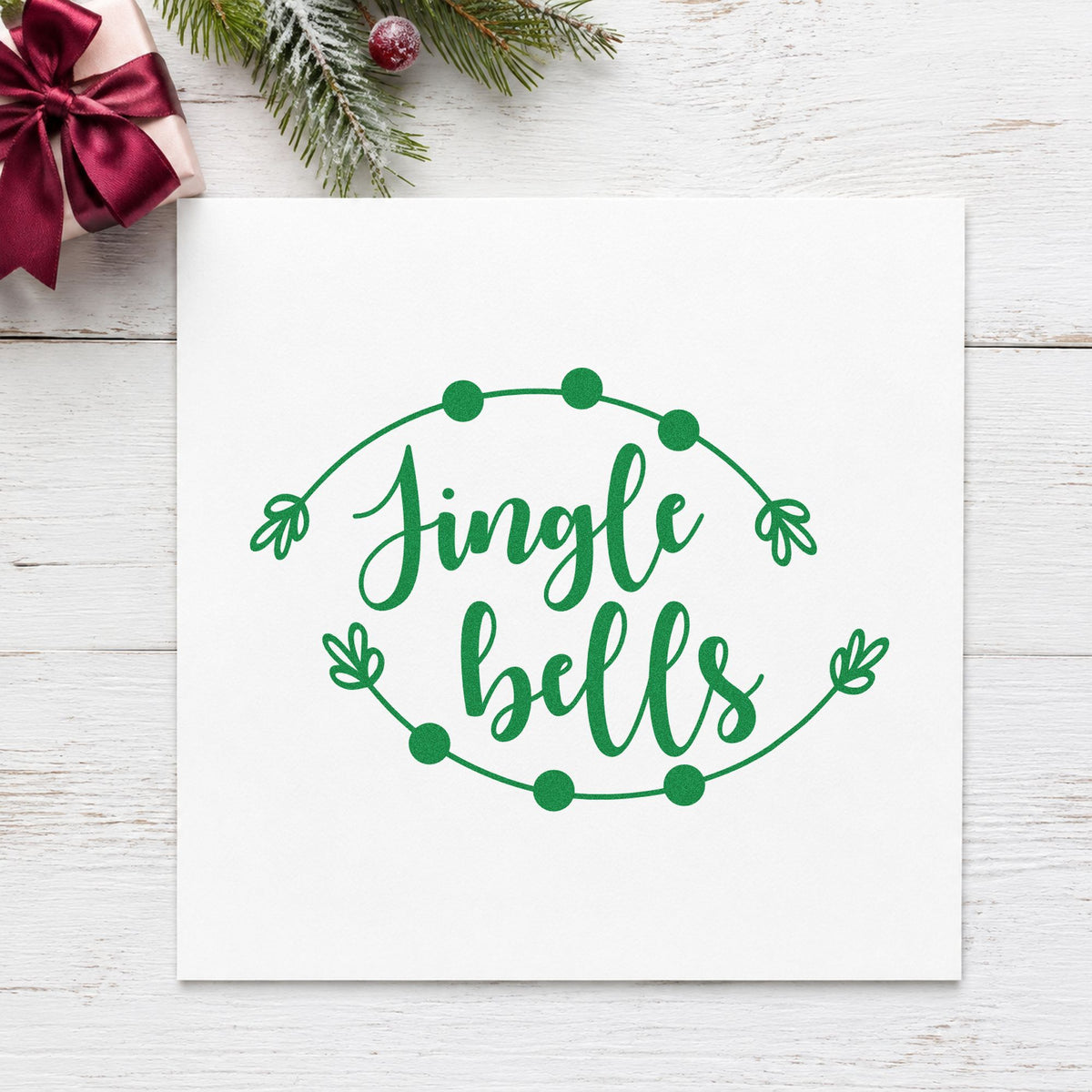 Jingle Bells Round Branch Frame craft stamp imprint in green ink on a handmade project, one idea being medallion gift tags.