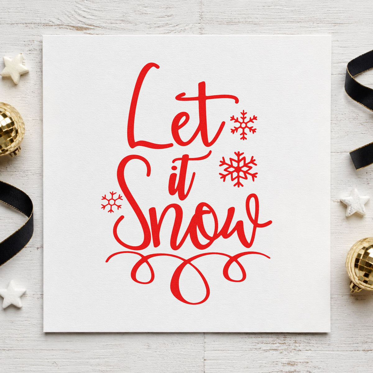 Let It Snow Loop Flourish rubber stamp shown in red ink, stamped for projects such as salt bin labels.