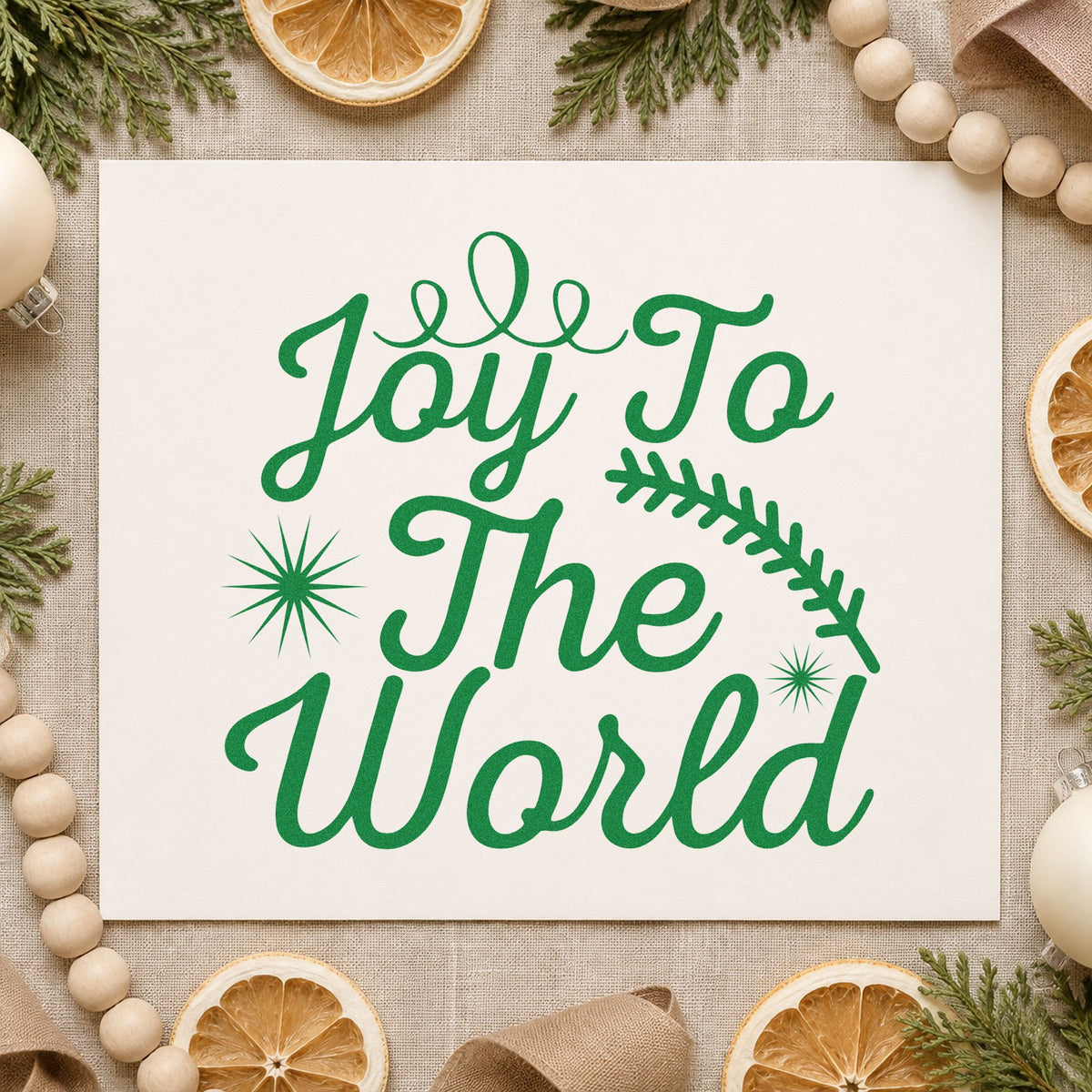 Joy To The World Sprig craft stamp imprint in green ink on a handmade project, one idea being seedling gift tags.
