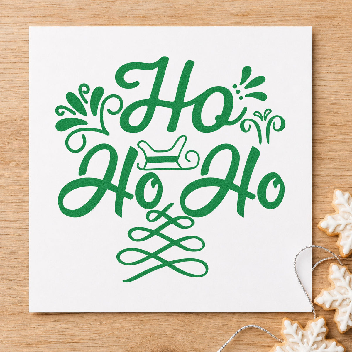 Ho Ho Ho Sleigh craft stamp imprinted in green ink on paper, a design suited to framed hearth panel.