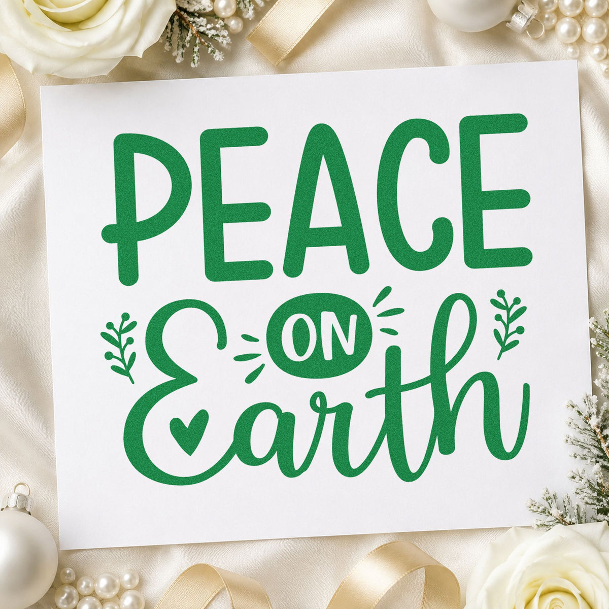 Peace On Earth Heart craft stamp imprint in green ink on a handmade project, one idea being exchange gift tags.