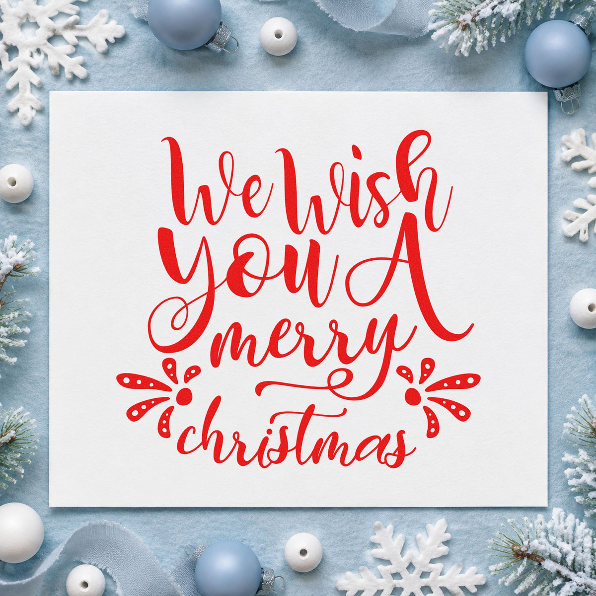We Wish Merry Christmas craft stamp in red ink on cardstock, an easy option for envelope liner printing.