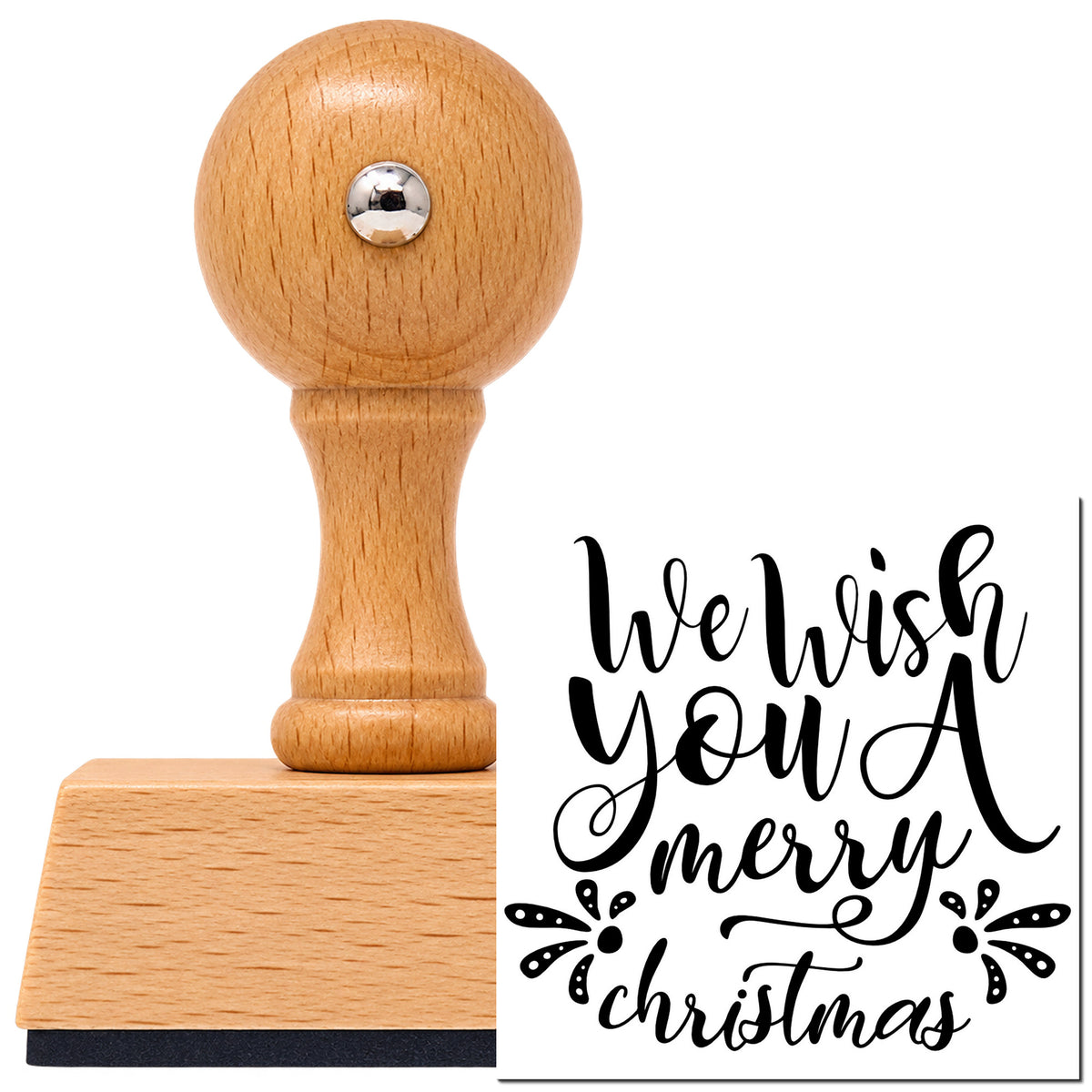 Vintage Pro beech wood stamp with a round knob handle, shown with its black We Wish Merry Christmas imprint on white.