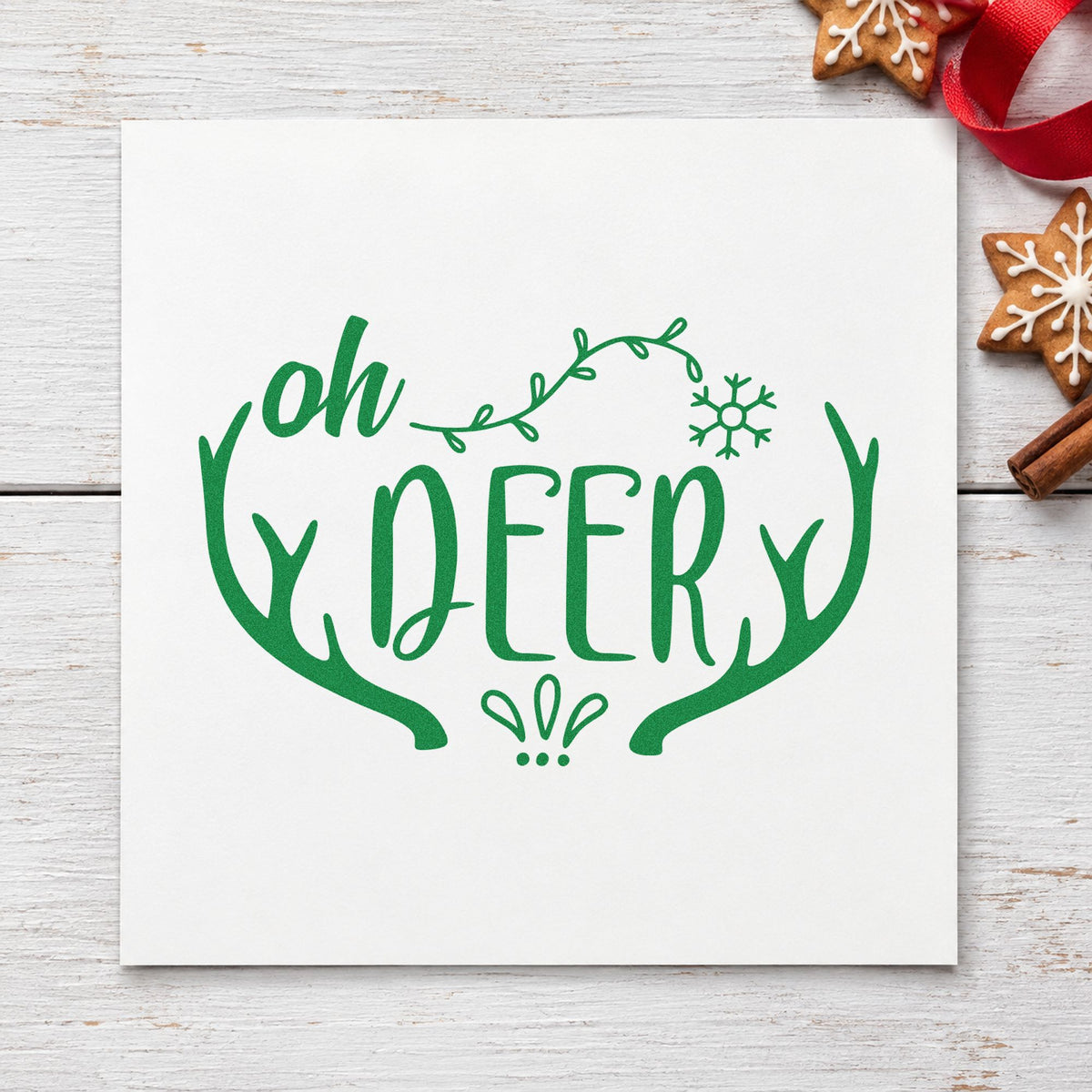 Oh Deer Antler Frame craft stamp imprinted in green ink on paper, a design suited to framed oval mat.