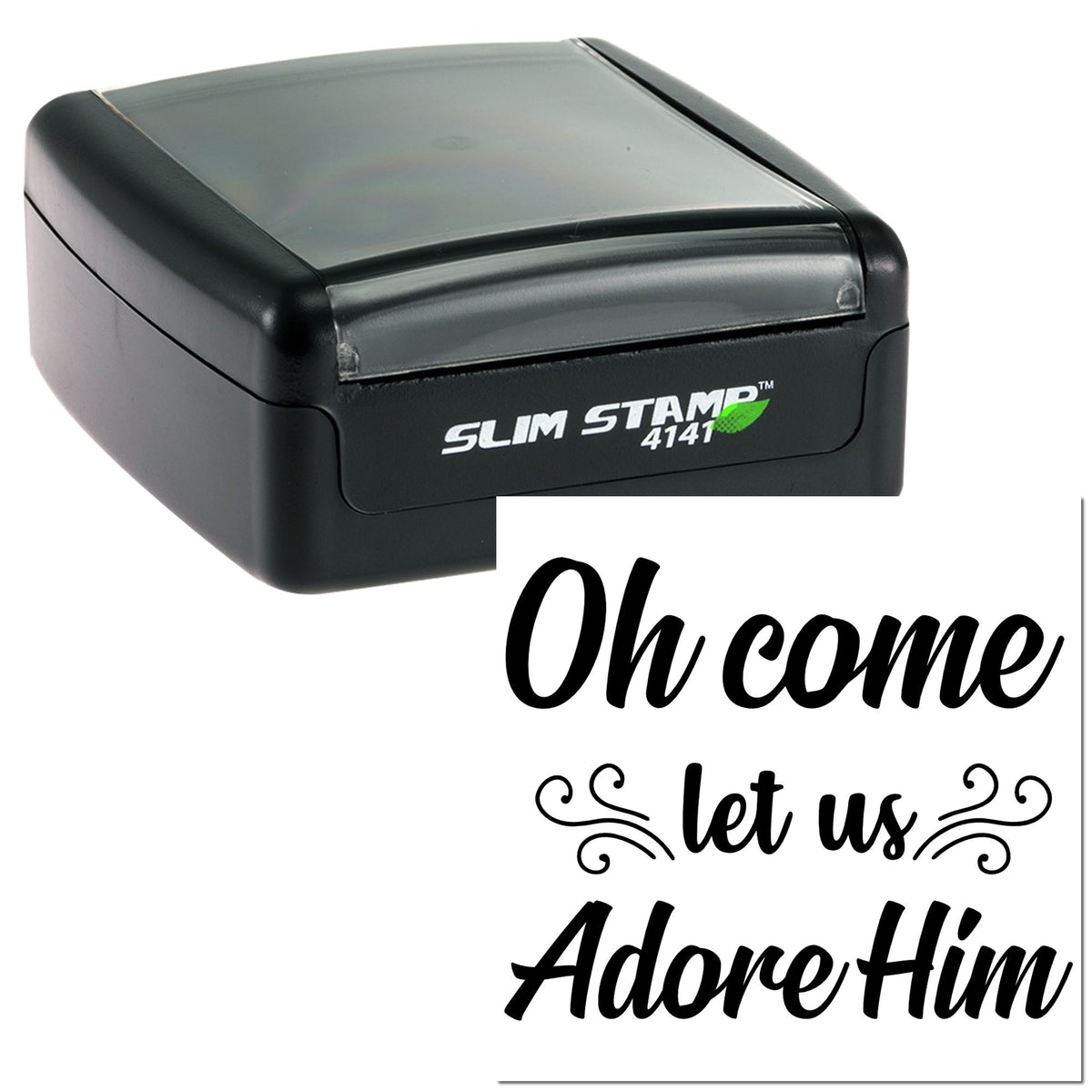 Black Slim Stamp 4141 self-inking stamp with green leaf logo beside white card reading Oh come let us Adore Him in black script.