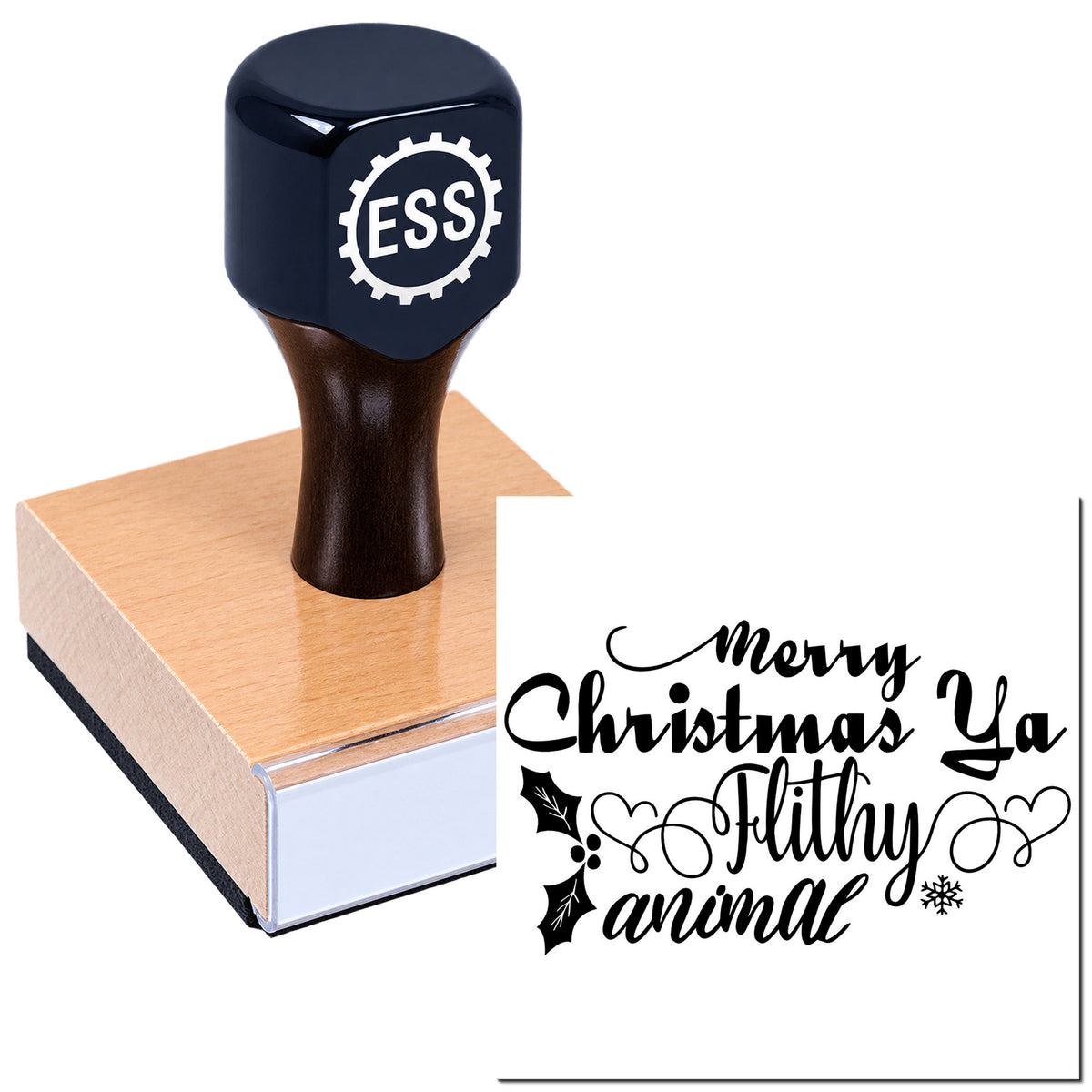 Navy ESS rubber stamp on a wooden block beside a black Christmas seal reading "Merry Christmas Ya Filthy Animal."
