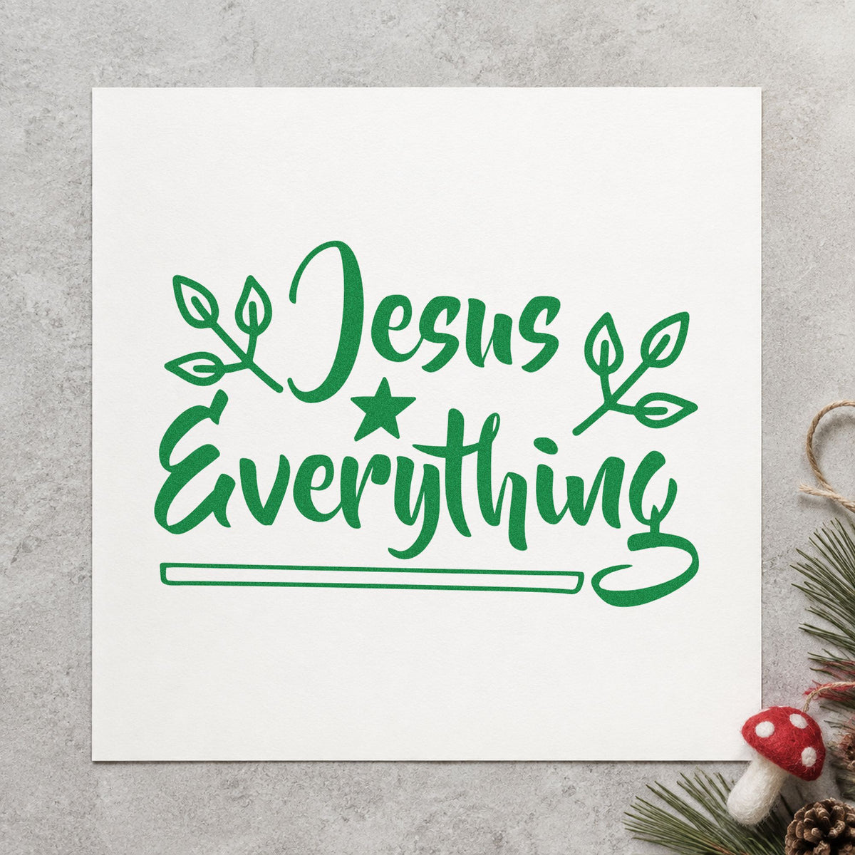 Jesus Everything Star And Leaves craft stamp imprint in green ink on a handmade project, one idea being tract bundle tags.