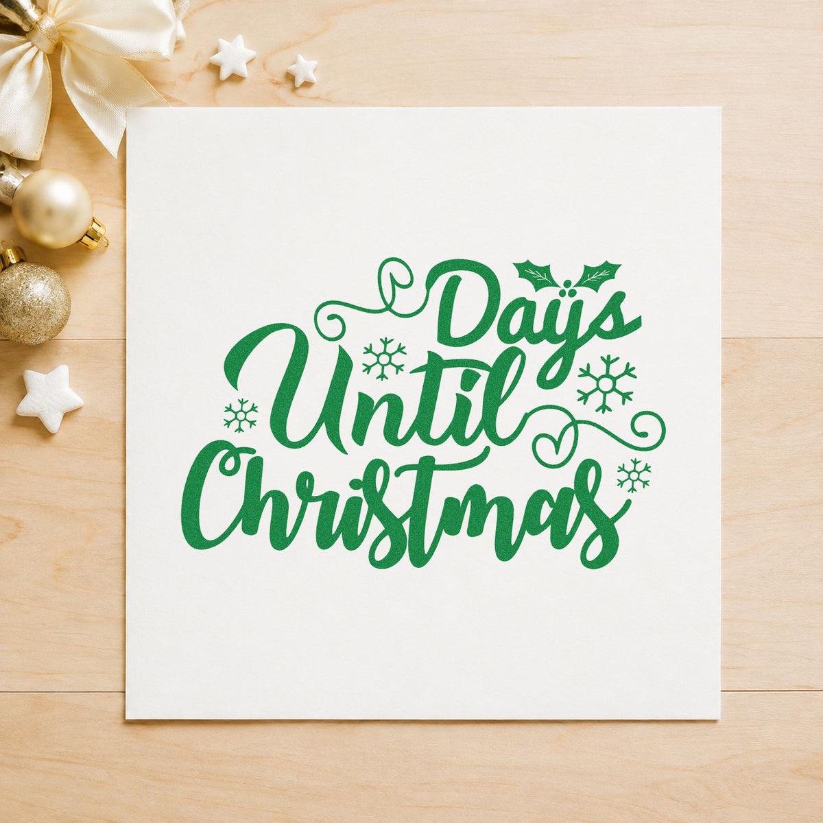 Days Until Christmas craft stamp imprint in green ink on a handmade project, one idea being daily gift tags.
