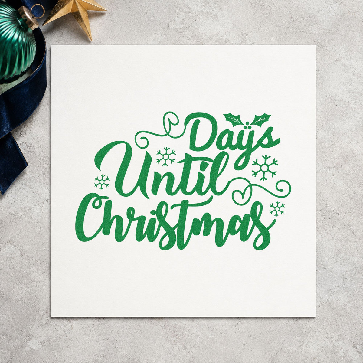 Days Until Christmas craft stamp imprinted in green ink on paper, a design suited to framed chalk board.