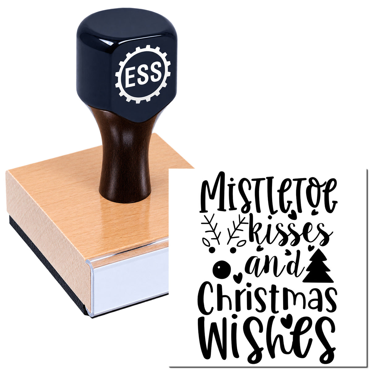 Black ESS stamp and seal on a wooden block with pink base, printing festive "Mistletoe kisses and Christmas wishes" text.