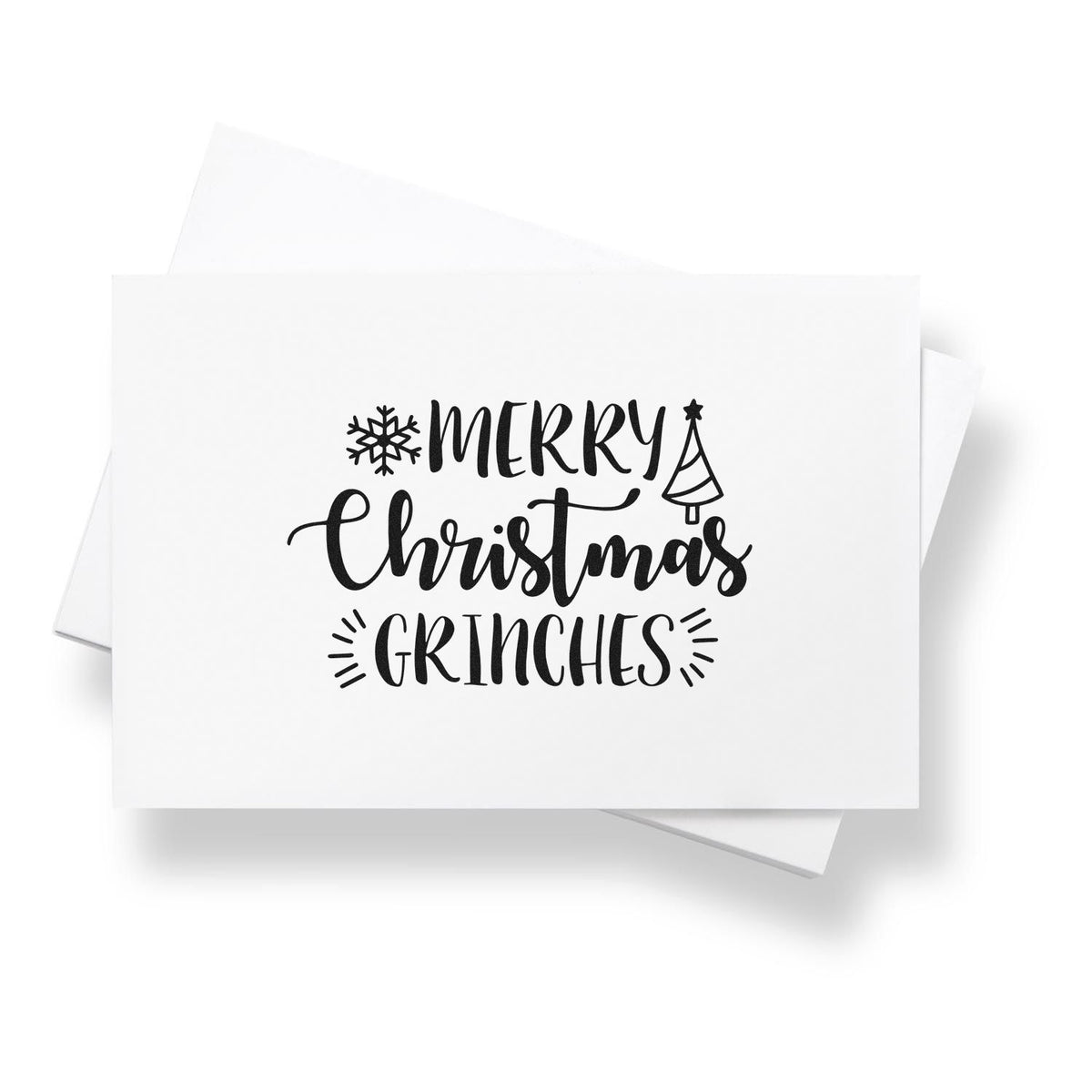 Black Merry Christmas Grinches stamp seal on white card, with snowflake and Christmas tree accents.